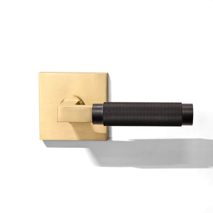 Golden black half-knurled square door handle