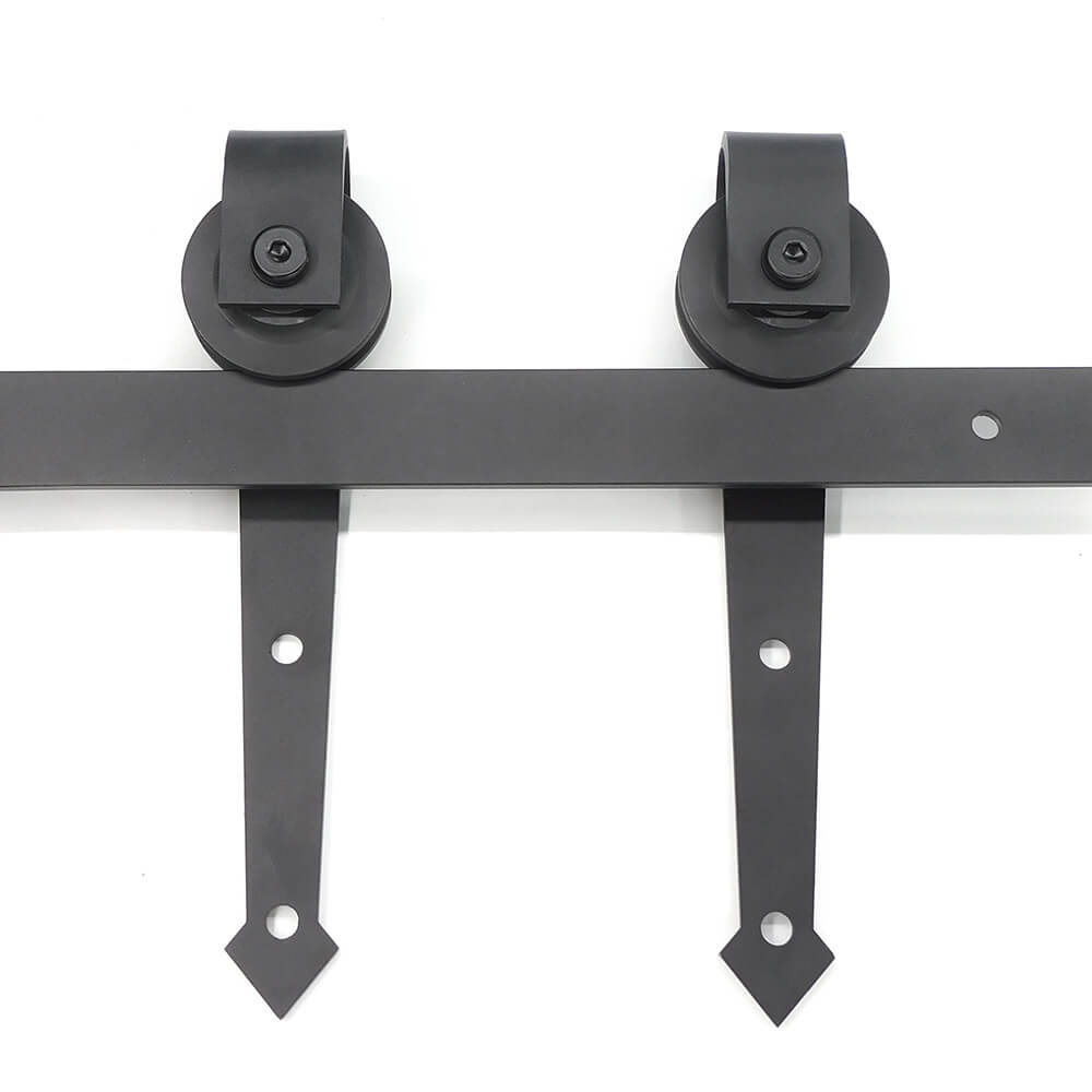 The pulleys of two barn door hardware sets are on the track