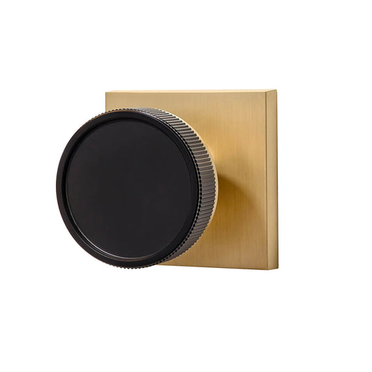 Quadrato Rosette with Black Half Knurled Design Knob in Satin Brass Picture