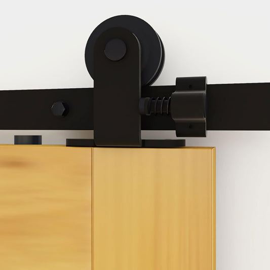 Details of installing the top mounted barn door hardware kit on the door